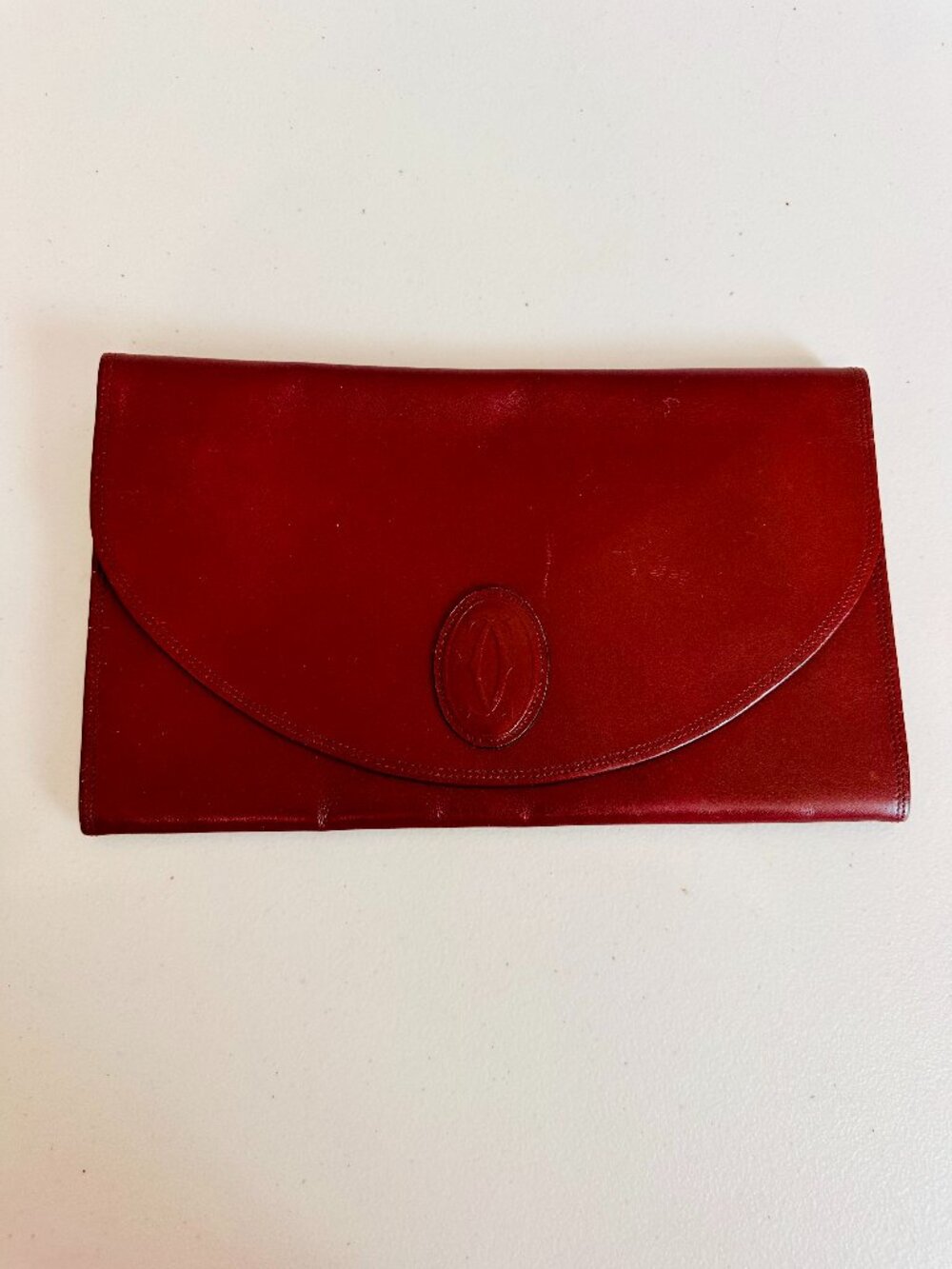 AUTHENTIC MUST DE CARTIER BORDEAUX LEATHER CLUTCH